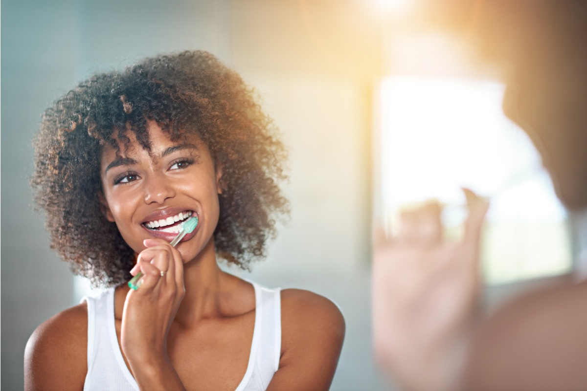 Woman demonstrating great oral hygiene